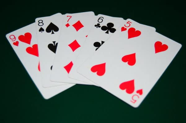 Does Three of a Kind Beat a Straight?