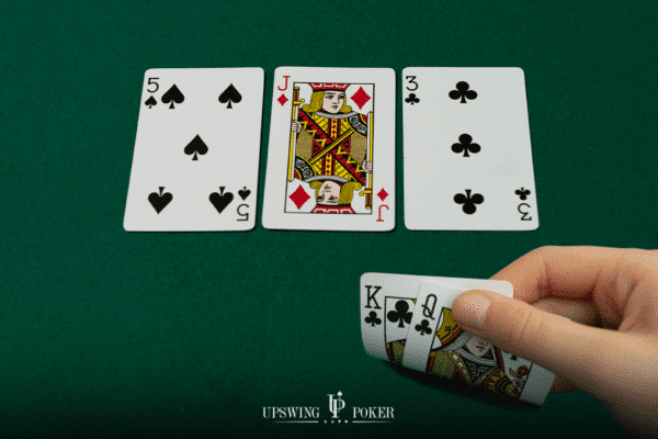 overcards k-q of clubs on j-5-3 with one club